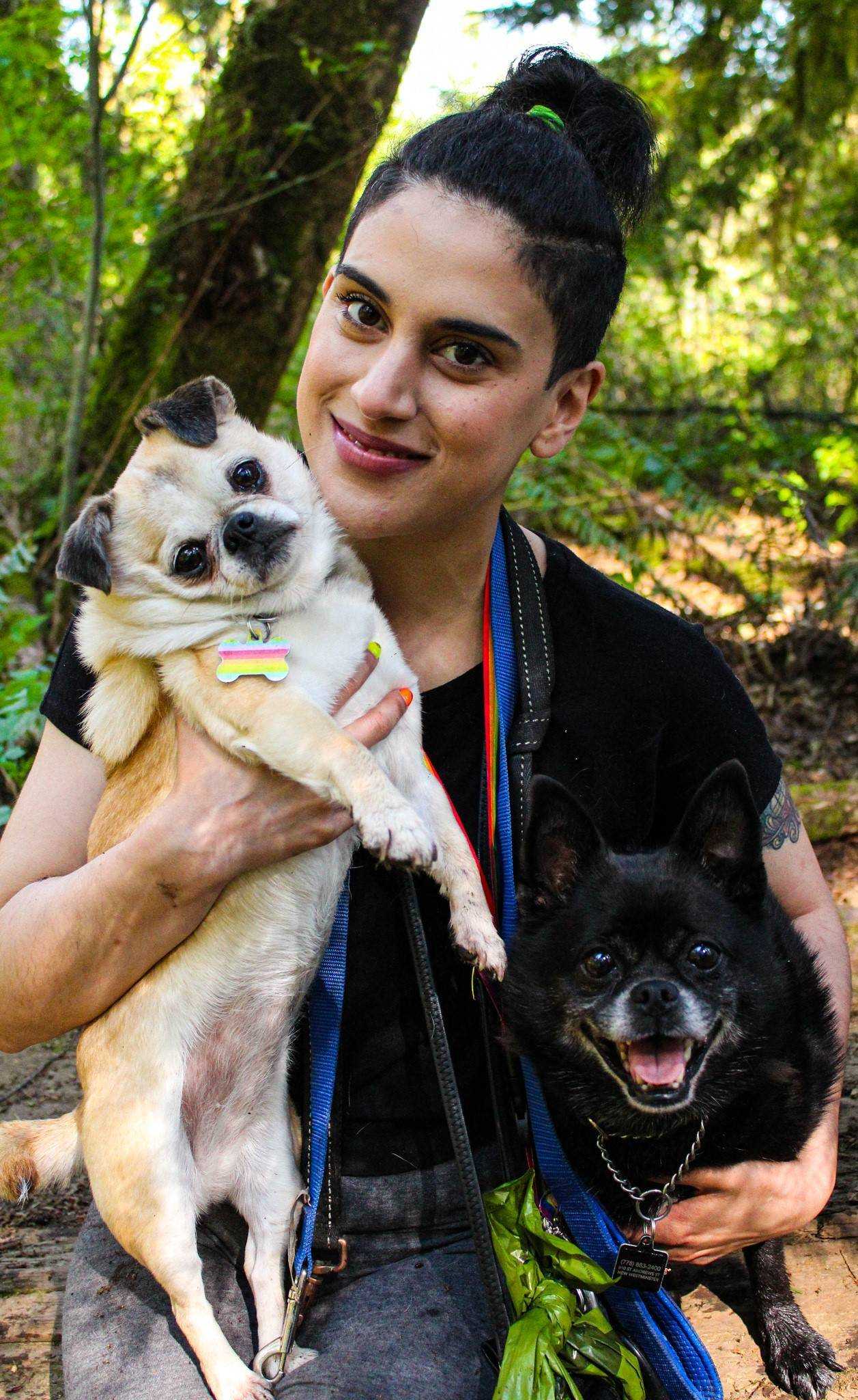 Portrait of Maryam aka Mrs Paws with her two dogs Keeley and Bella